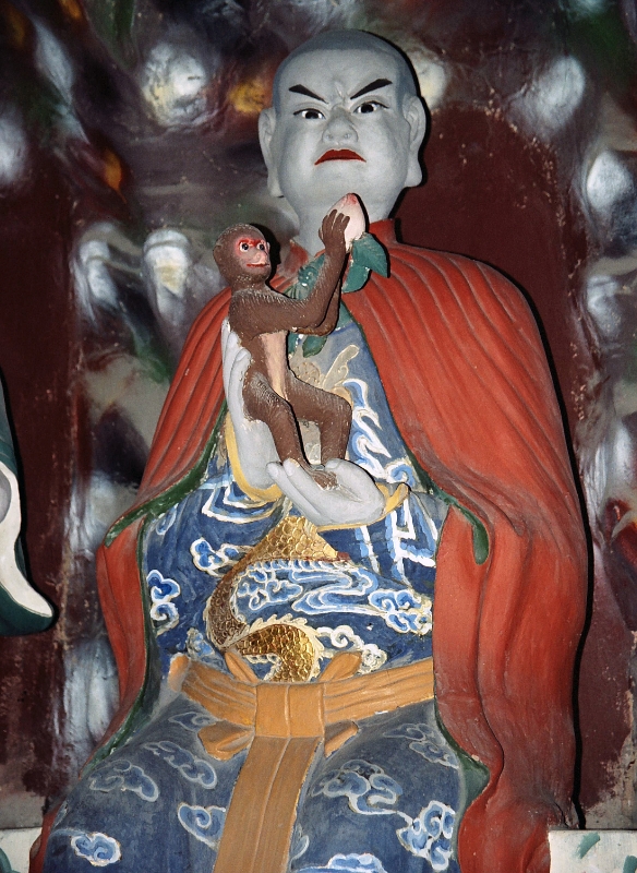 buddha and monkey, Leshan China.jpg